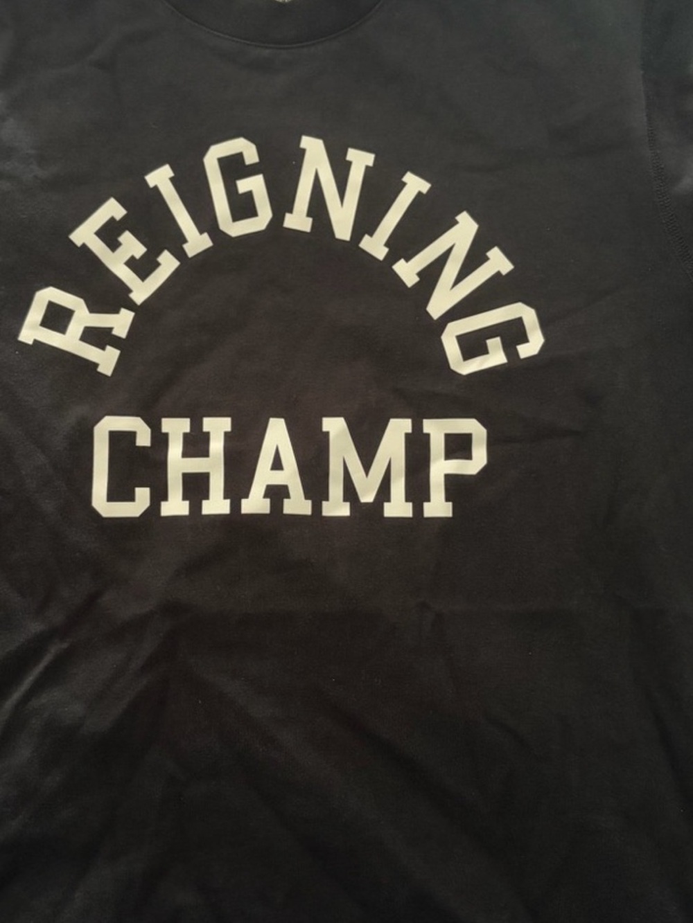 Reigning Champ Black Short Sleeve Logo Tee with White Arch Print.